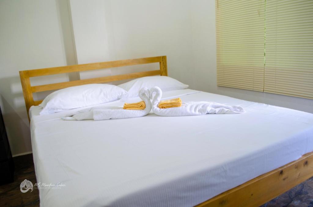 Postel nebo postele na pokoji v ubytování MS Mountain Cabin