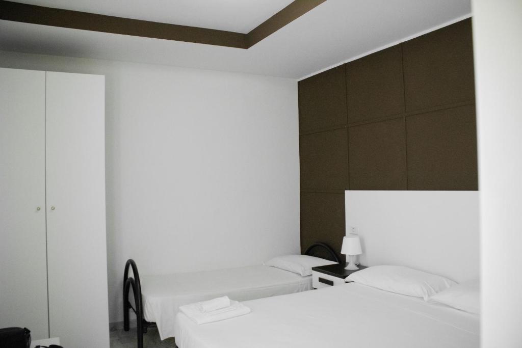 Postel nebo postele na pokoji v ubytování Hotel Altamira