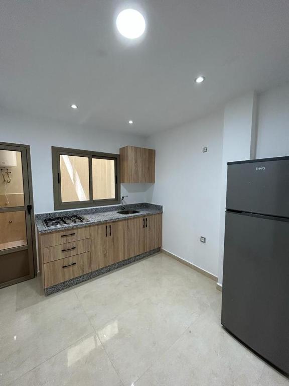 Kuchyň nebo kuchyňský kout v ubytování O' appartement Alhoceima