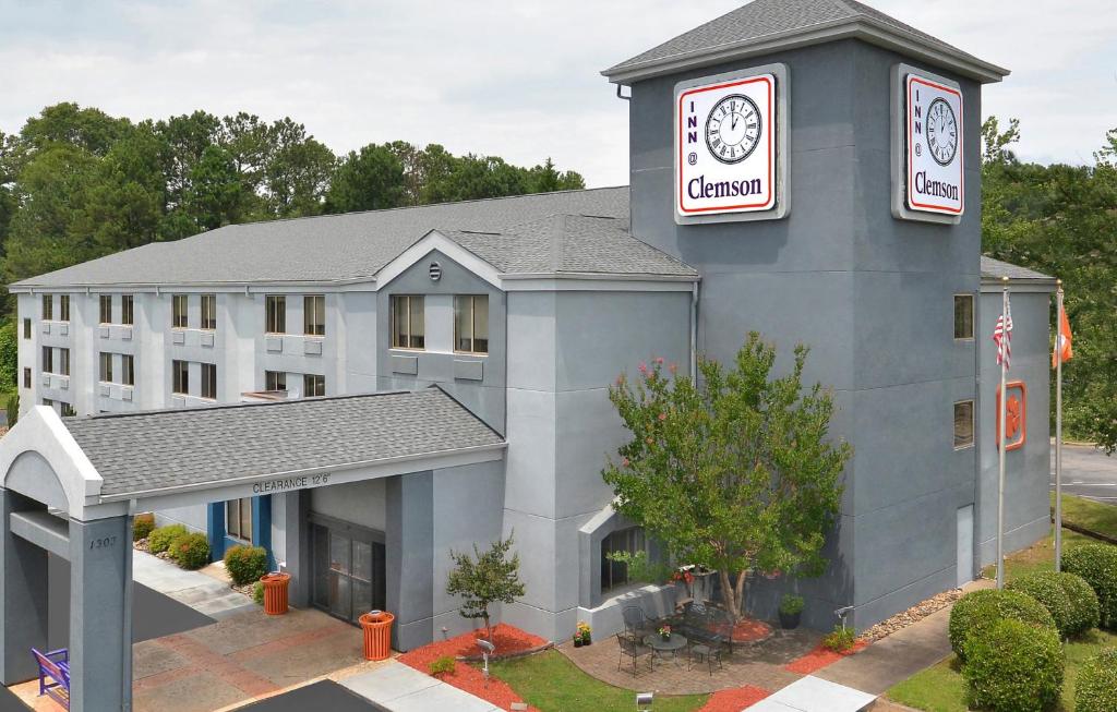 a rendering of a hotel with a clock tower at Inn at Clemson in Clemson
