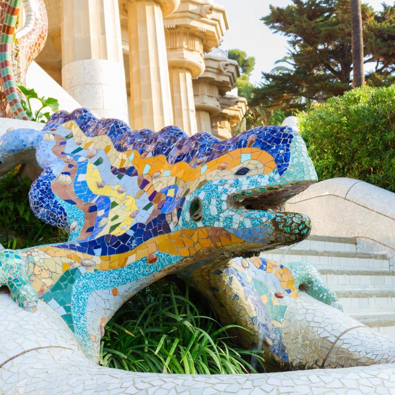 a mosaic dragon statue in front of a building at TOC Hotel Las Ramblas in Barcelona