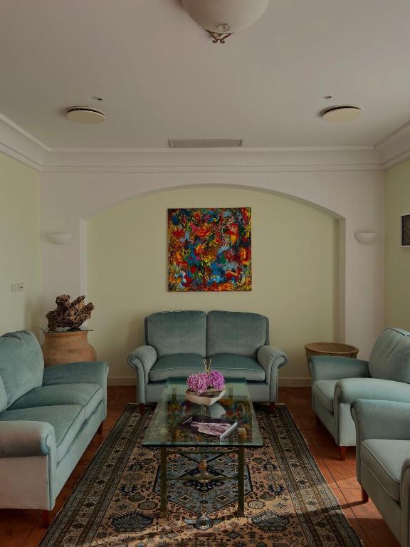 Posezení v ubytování Hotel La Lampara