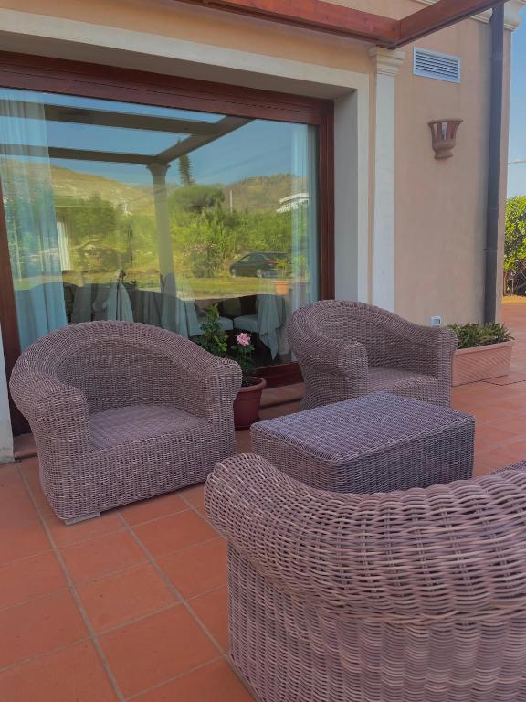 Posezení v ubytování Hotel La Lampara