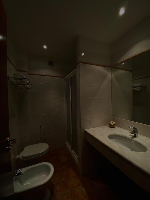 Koupelna v ubytování Hotel La Lampara