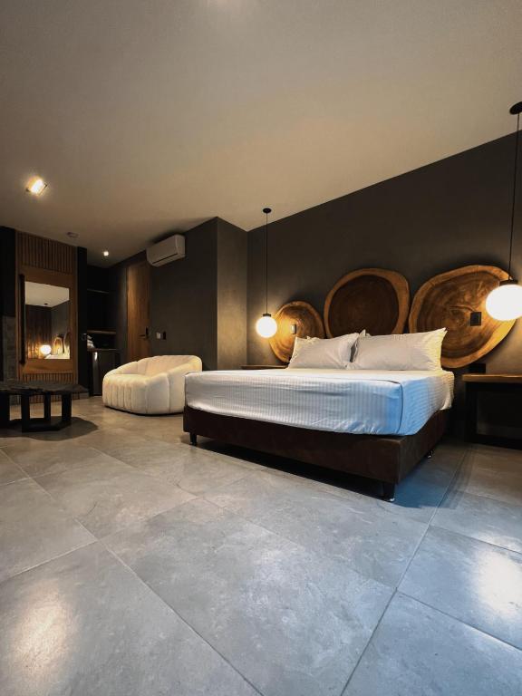 Postel nebo postele na pokoji v ubytování Hotel Zelva Negra
