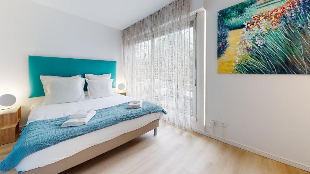 En eller flere senge i et v&aelig;relse p&aring; Maison Mandarine Colmar 5 bedrooms 180m2