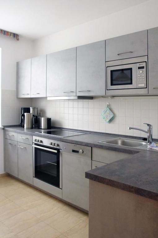 Kuchyň nebo kuchyňský kout v ubytování Haus Buchenhof
