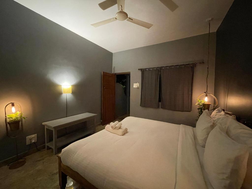Postel nebo postele na pokoji v ubytování Tien B&B & Bistro
