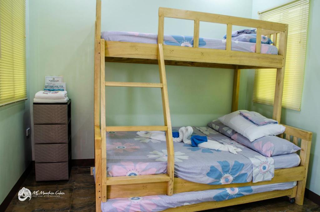 Postel nebo postele na pokoji v ubytování MS Mountain Cabin