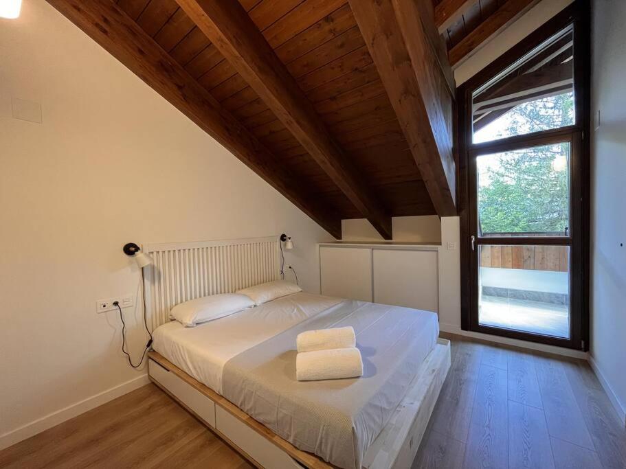 Postel nebo postele na pokoji v ubytování BPIRINEOS- Aire Pirineos