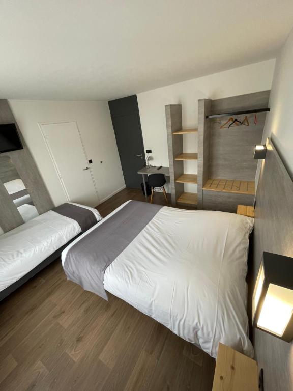 Postel nebo postele na pokoji v ubytování Hotel Castel
