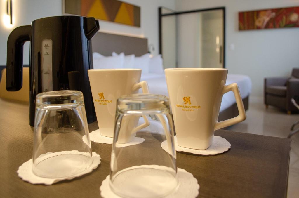 Comodidades para preparar café e chá em Royal Boutique Savassi Hotel