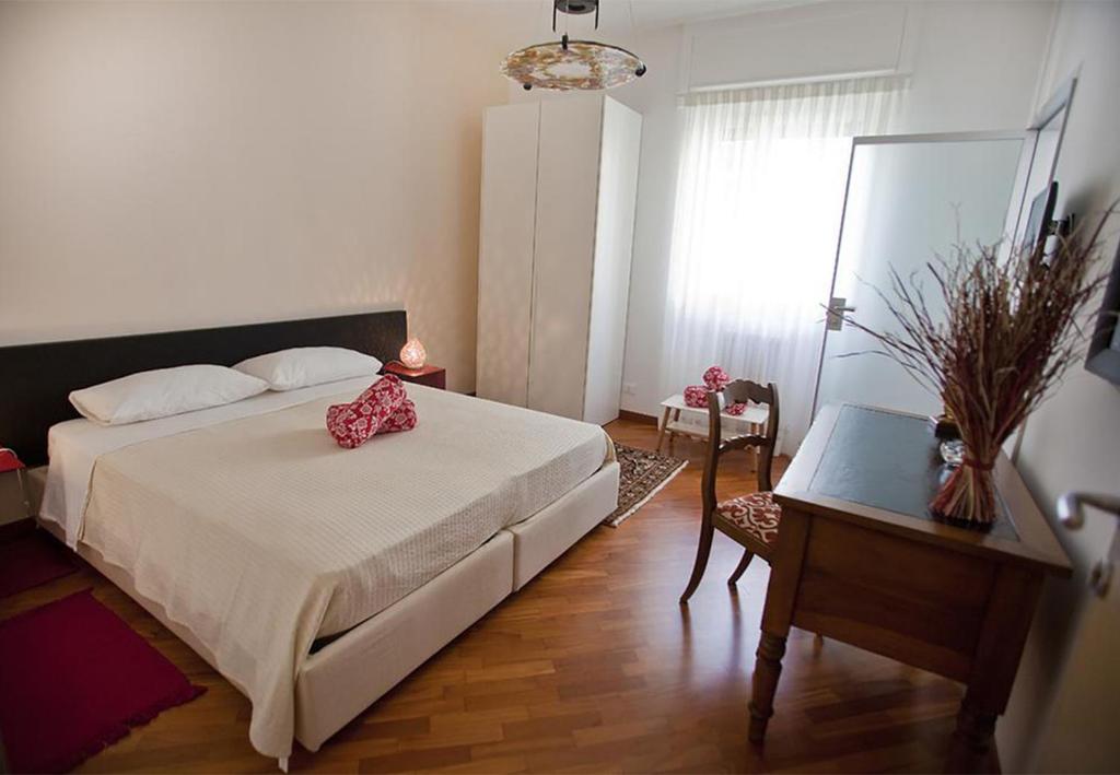 Postel nebo postele na pokoji v ubytování Casa di Sabel