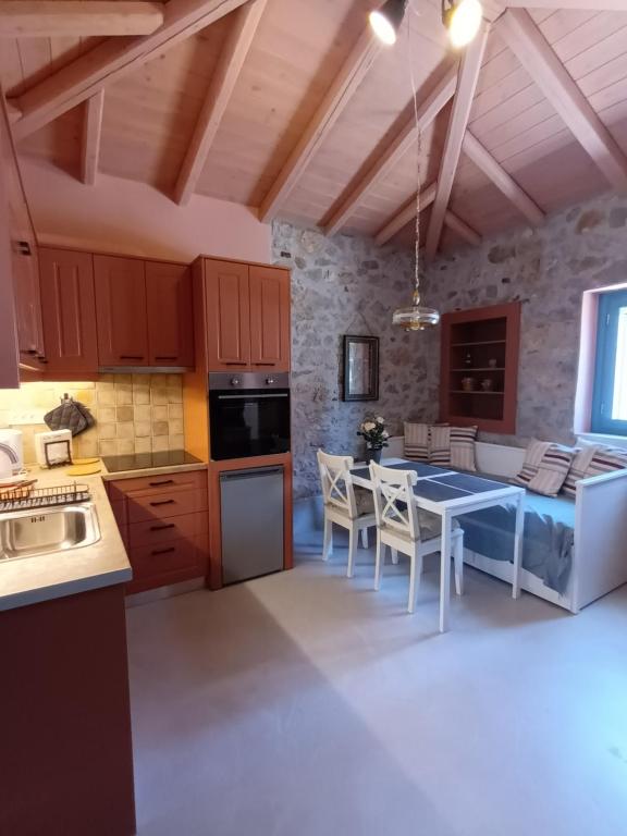 Kuchyň nebo kuchyňský kout v ubytování Apartment Rustico