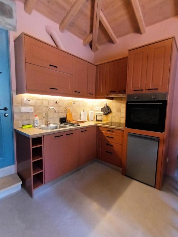 Kuchyň nebo kuchyňský kout v ubytování Apartment Rustico