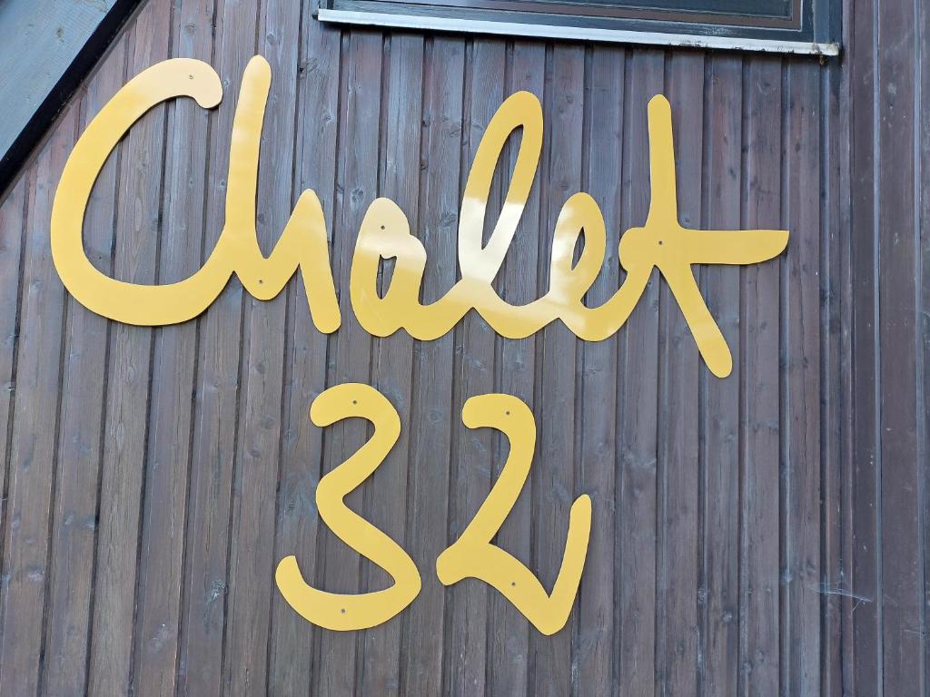 a sign on the side of a building with the word mcallen on at Chalet 32 in Nagel