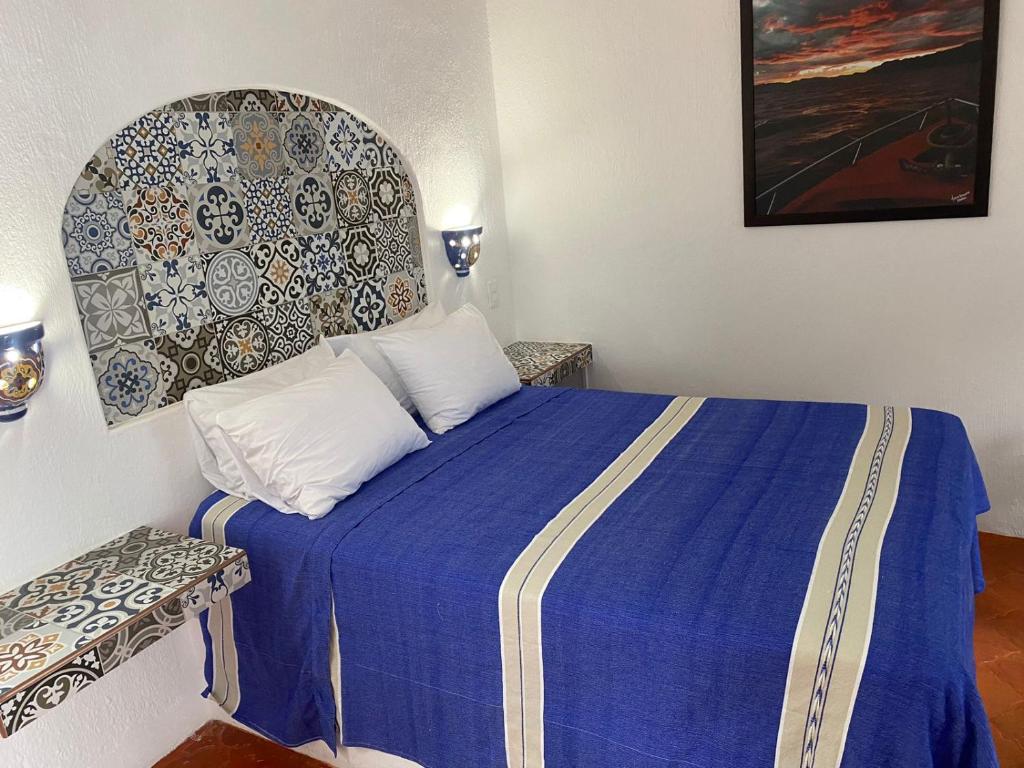 Postel nebo postele na pokoji v ubytování Casa Yollotzin