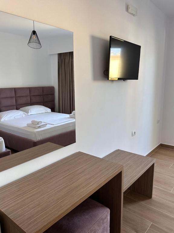 Postel nebo postele na pokoji v ubytování J&B Hotel