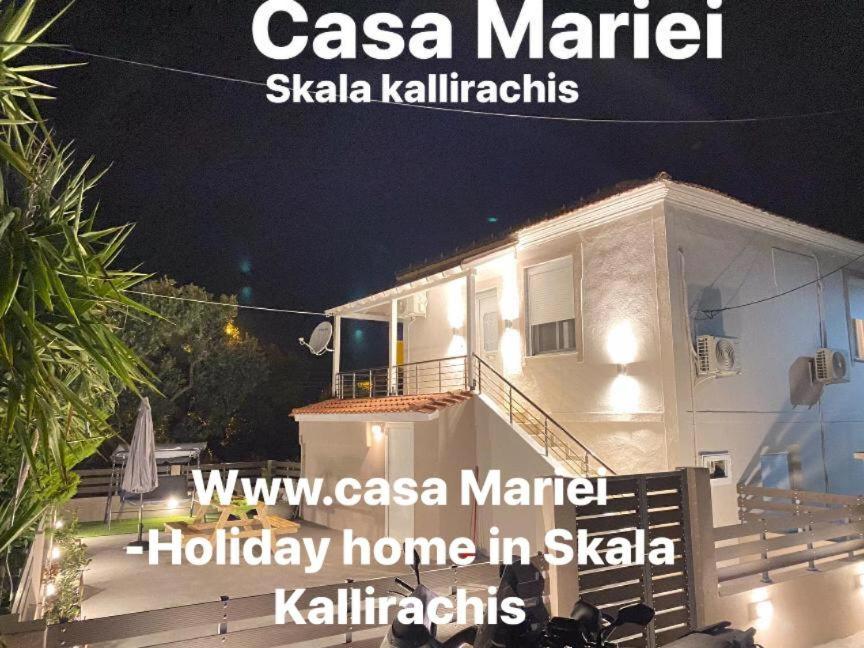 a poster for a holiday home in skala market at Casa Mariei in Skala Kallirakhis