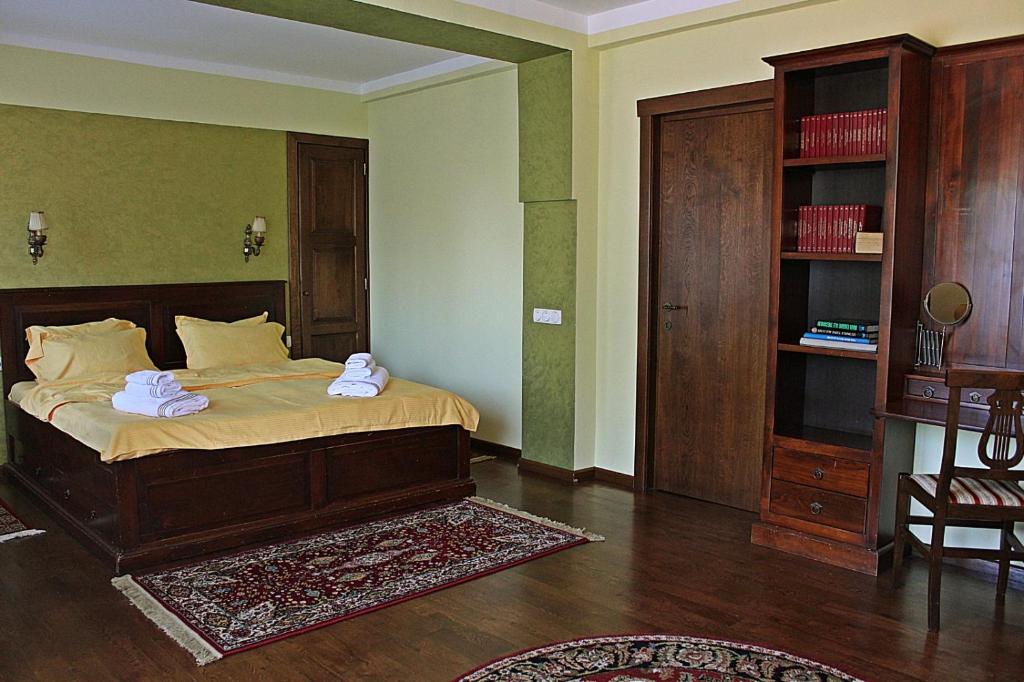 Vuode tai vuoteita majoituspaikassa Antik Apartment