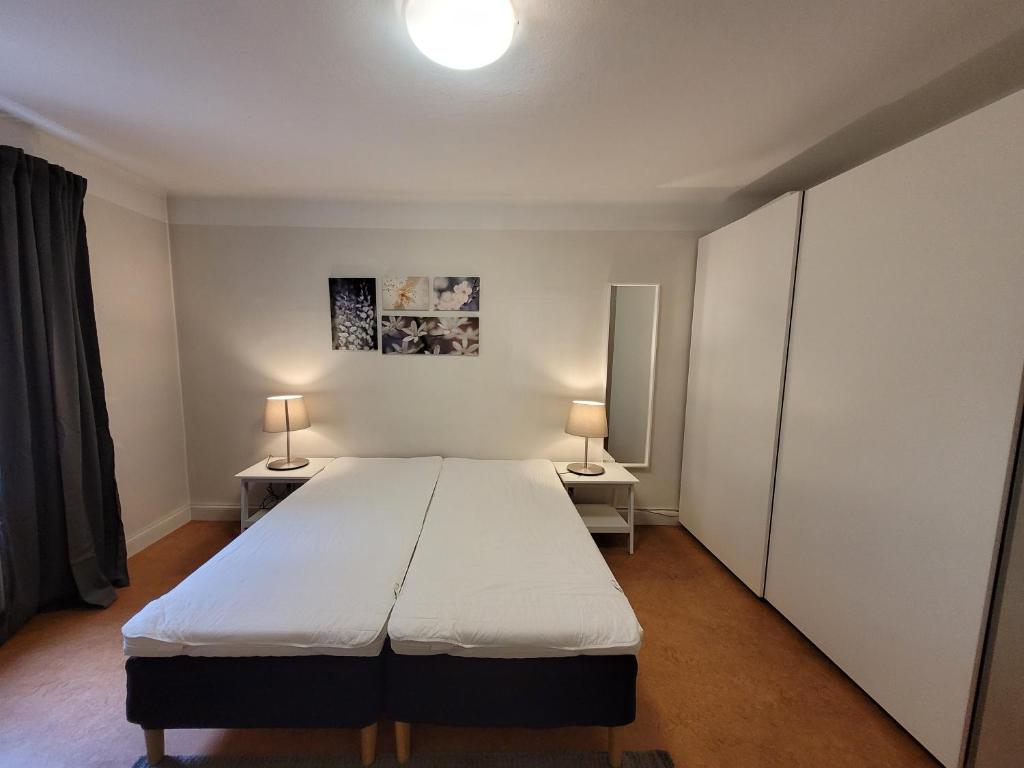 Postel nebo postele na pokoji v ubytování Home Inn PIP22