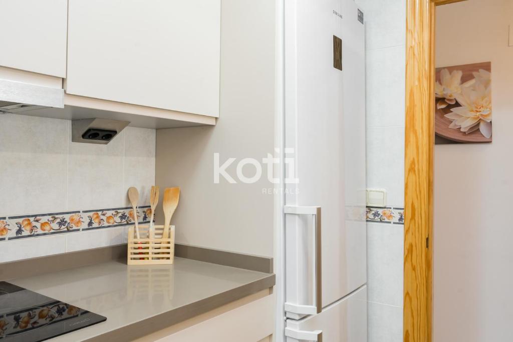 A kitchen or kitchenette at Koti Rentals - Gamycol 2