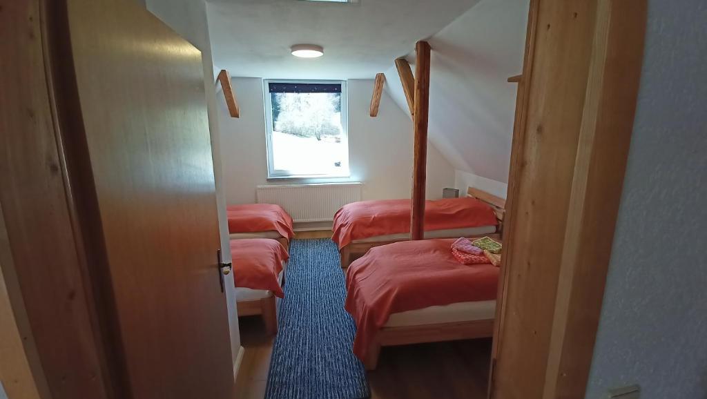 Postel nebo postele na pokoji v ubytování Haus Waldschänke
