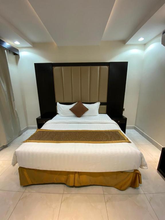 Postel nebo postele na pokoji v ubytování Alwan apartment hotel