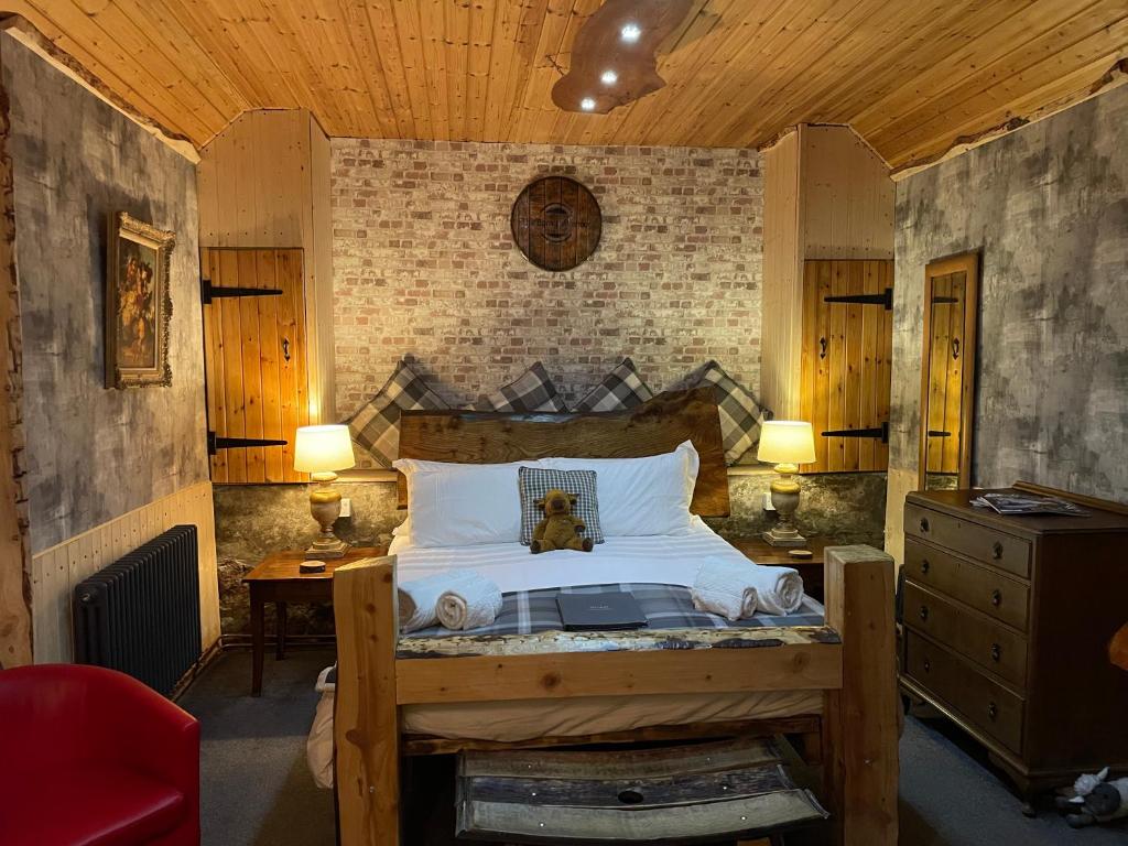 Ένα ή περισσότερα κρεβάτια σε δωμάτιο στο The Barn | Aberlour