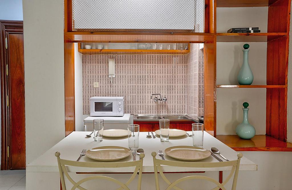 Kuchnia lub aneks kuchenny w obiekcie Apartamento Exclusivo en Sevilla