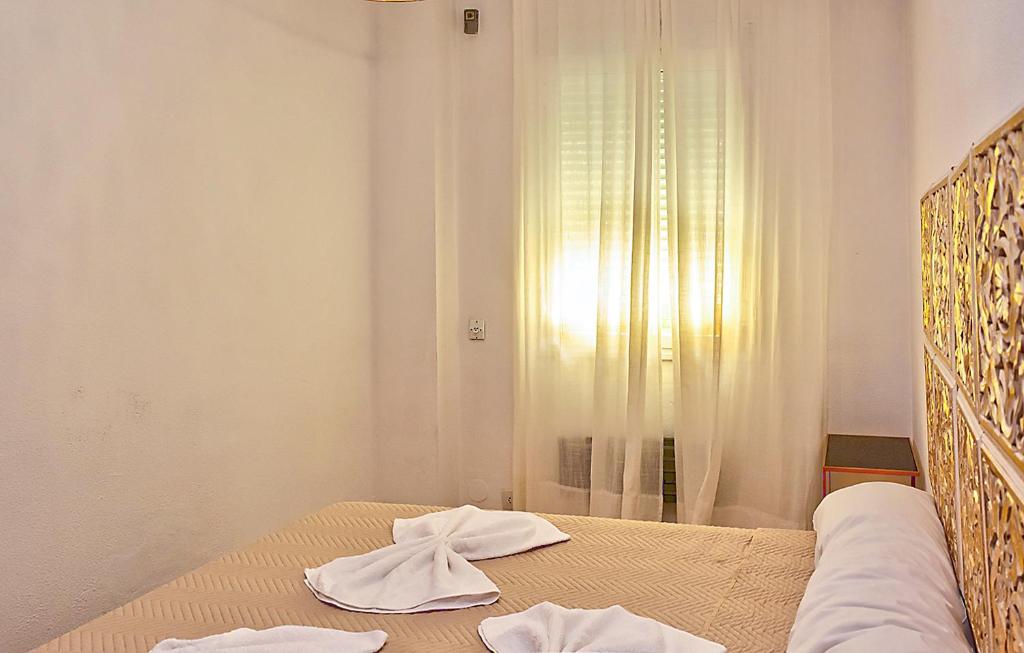 Łóżko lub łóżka w pokoju w obiekcie Apartamento Exclusivo en Sevilla