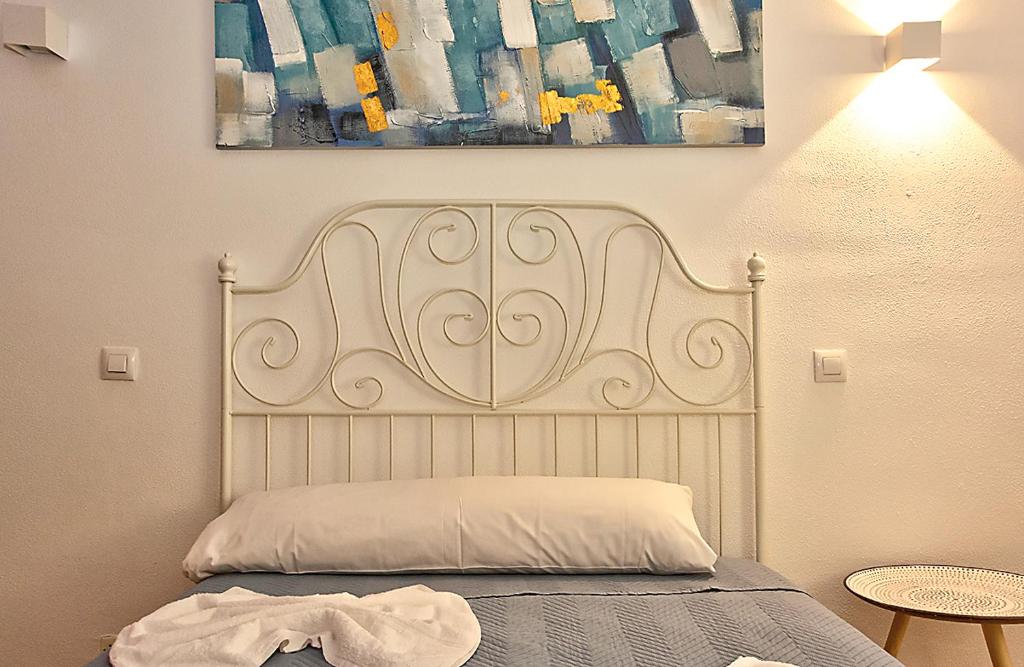 Łóżko lub łóżka w pokoju w obiekcie Apartamento Exclusivo en Sevilla