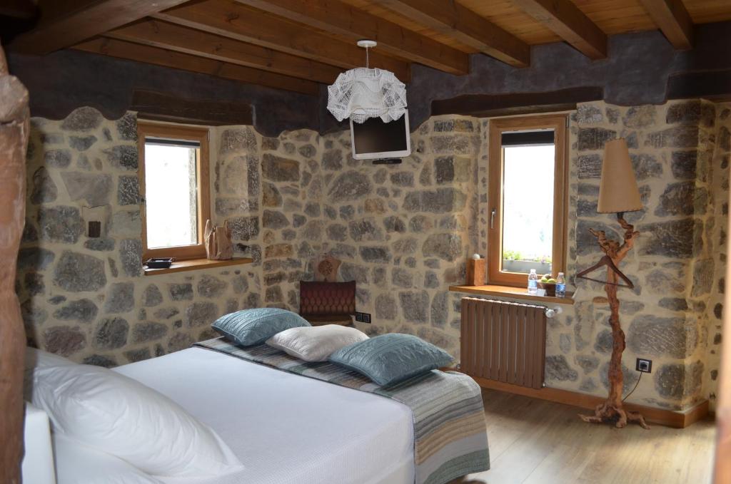 Postel nebo postele na pokoji v ubytování Casa Maru