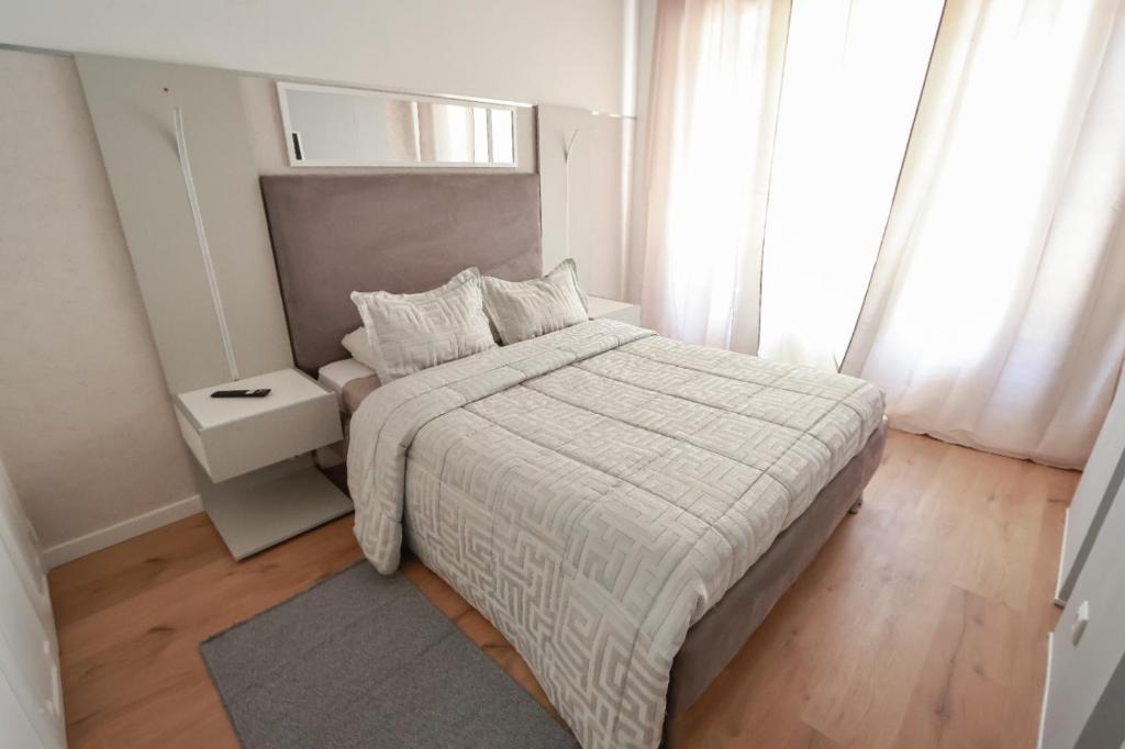 Postel nebo postele na pokoji v ubytování Grande Conforto