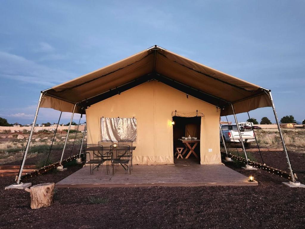 a tent with two chairs and a table in it at Double Eagle in Valle