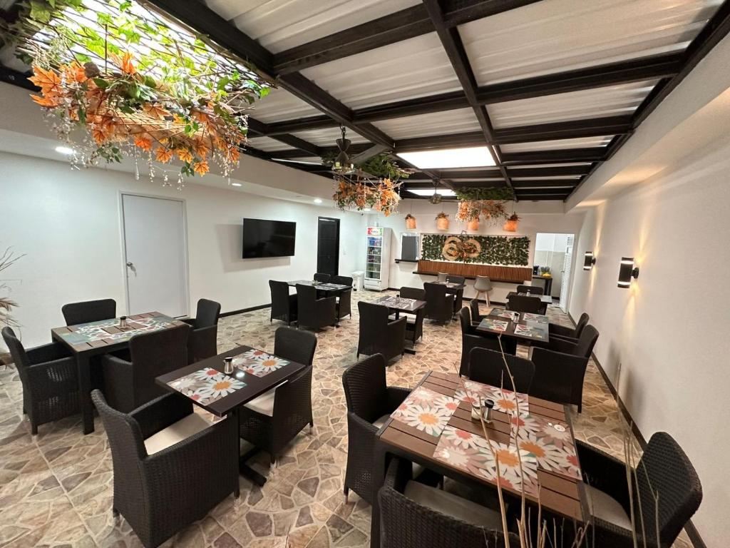 TV a/nebo společenská místnost v ubytování Hotel Zuriel Boutique