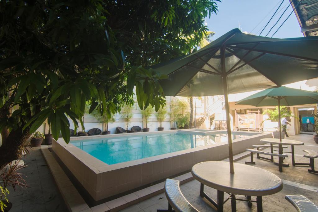 Bazén v ubytování Hotel Carmelita nebo v jeho okolí