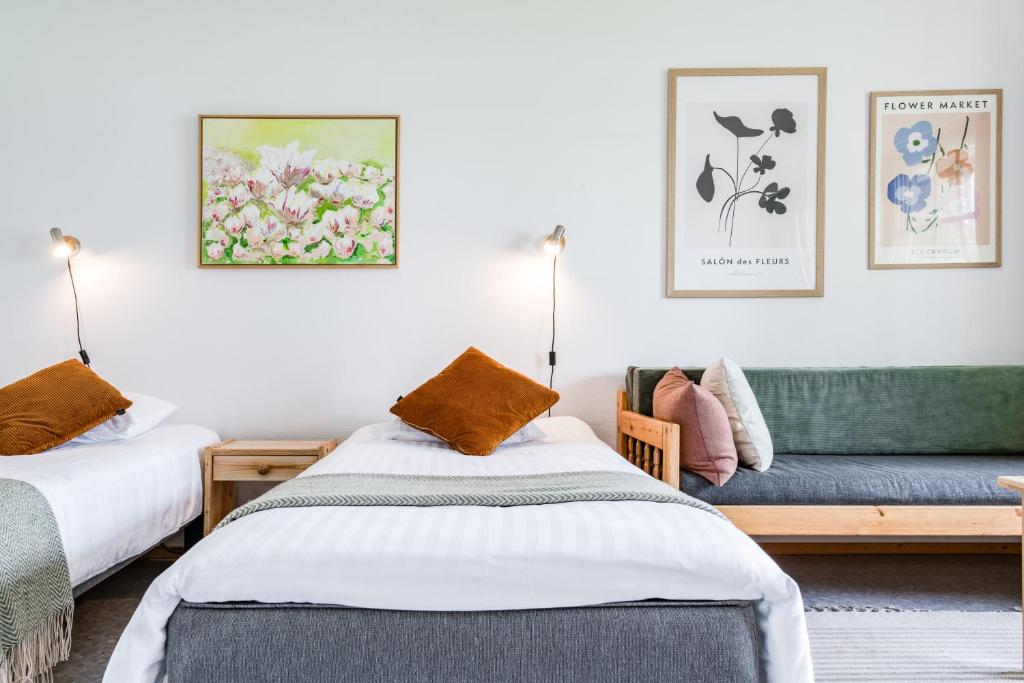 Кровать или кровати в номере Hotel Kuusamon Portti
