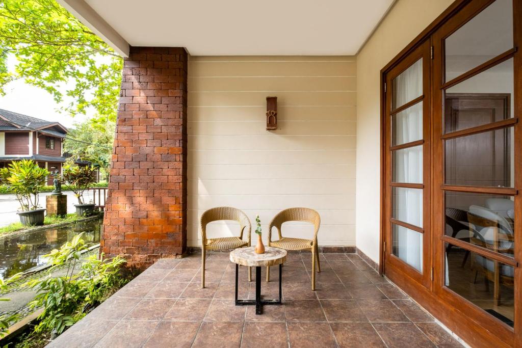 Mutiara Carita Cottages - Mutiara Double O Twin Sala