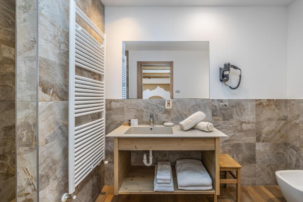 Kúpeľňa v ubytovaní Miraval Hotel