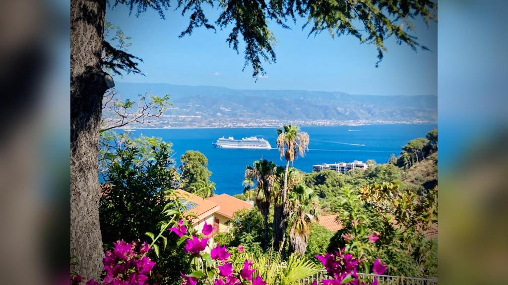 a view of a cruise ship in the water at Villa Scilla e Cariddi in Messina