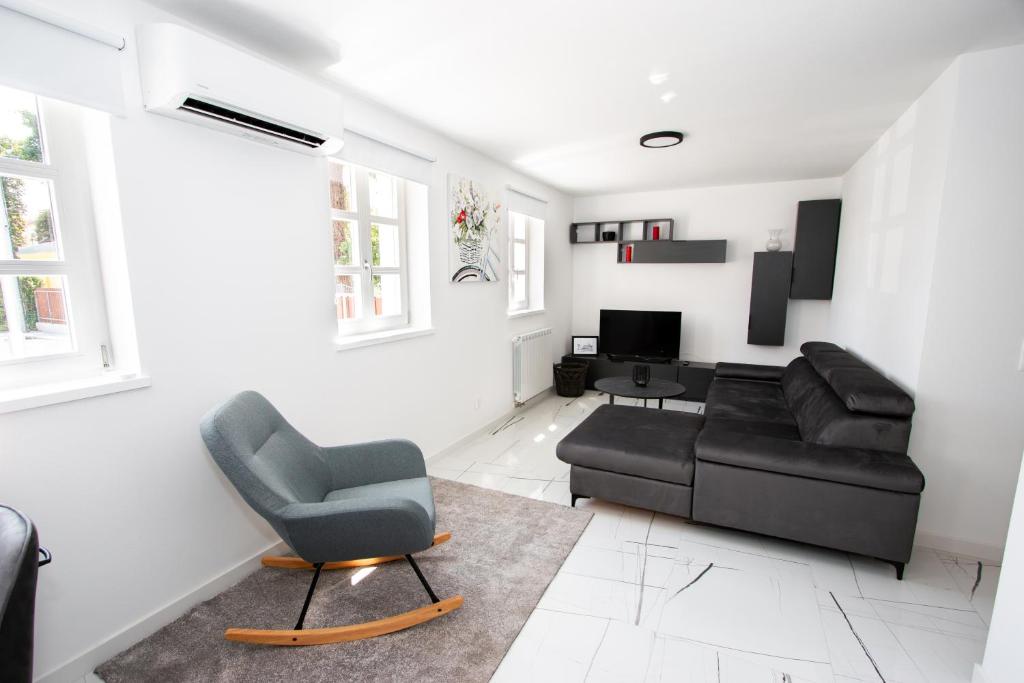 Posezení v ubytování Apartmani Kac