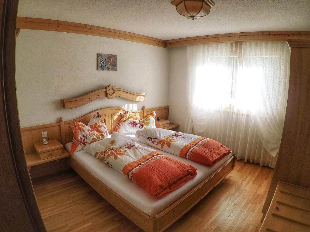 Postel nebo postele na pokoji v ubytování Haus Adora