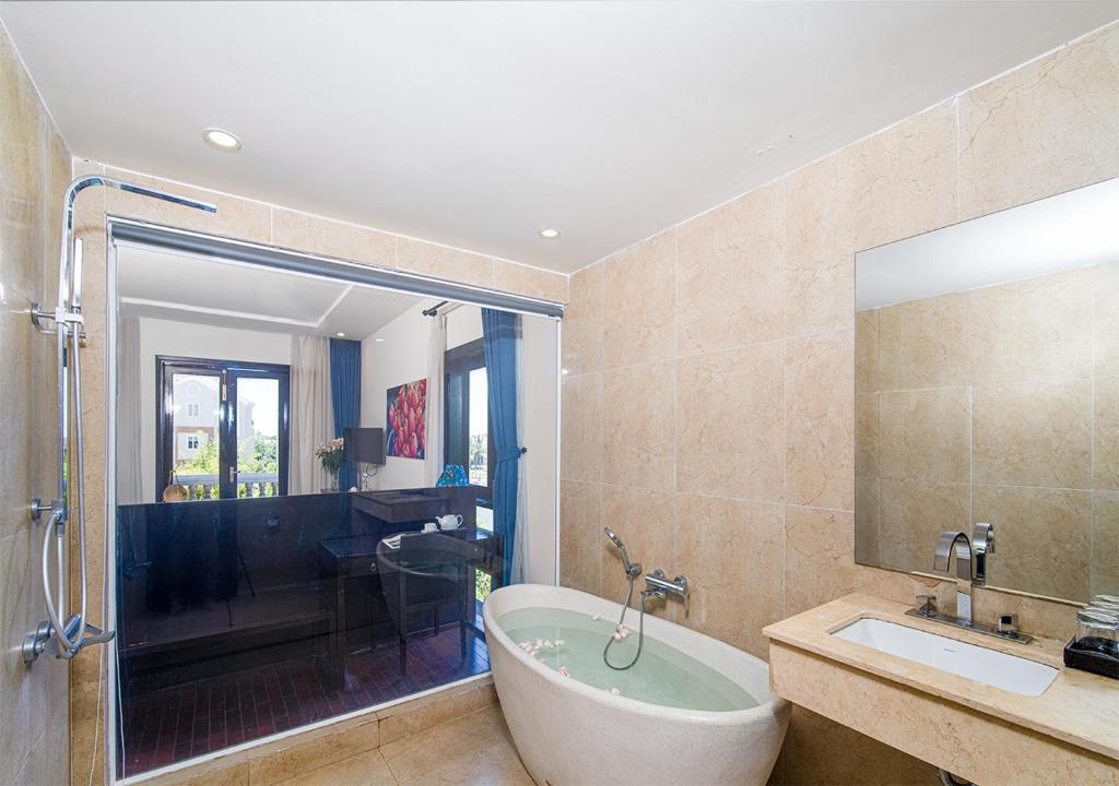 King Room Pool View and River View with Balcony and Bathtub