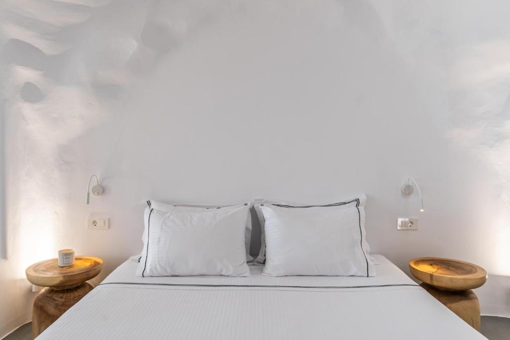 Postel nebo postele na pokoji v ubytování Numa Santorini