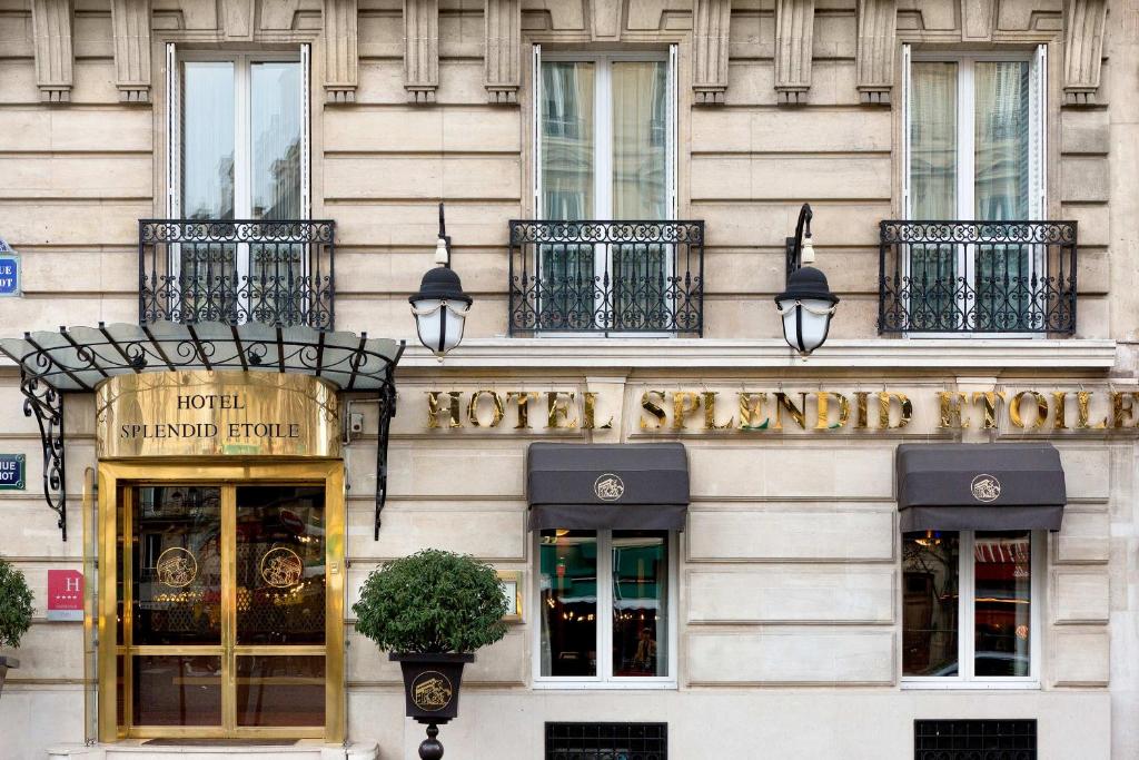 a building with a sign on the side of it at Splendid Etoile in Paris