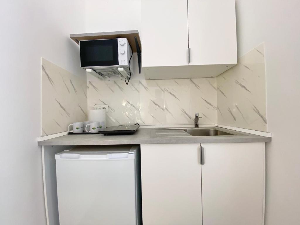 Kuchyň nebo kuchyňský kout v ubytování Joshua Home
