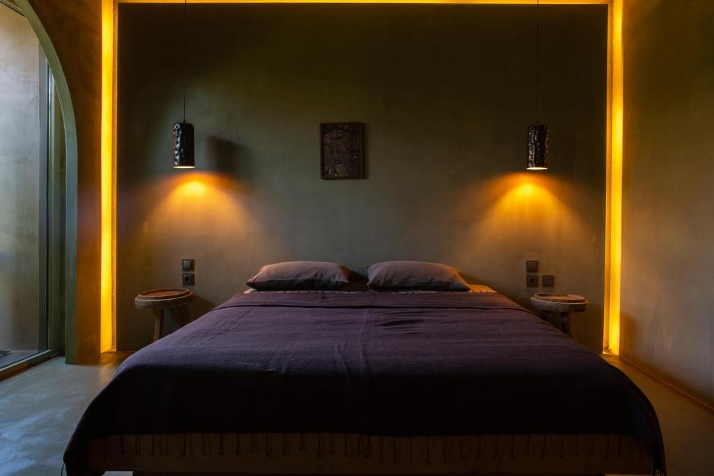 Postel nebo postele na pokoji v ubytování Life Gallery Hotel & Spa