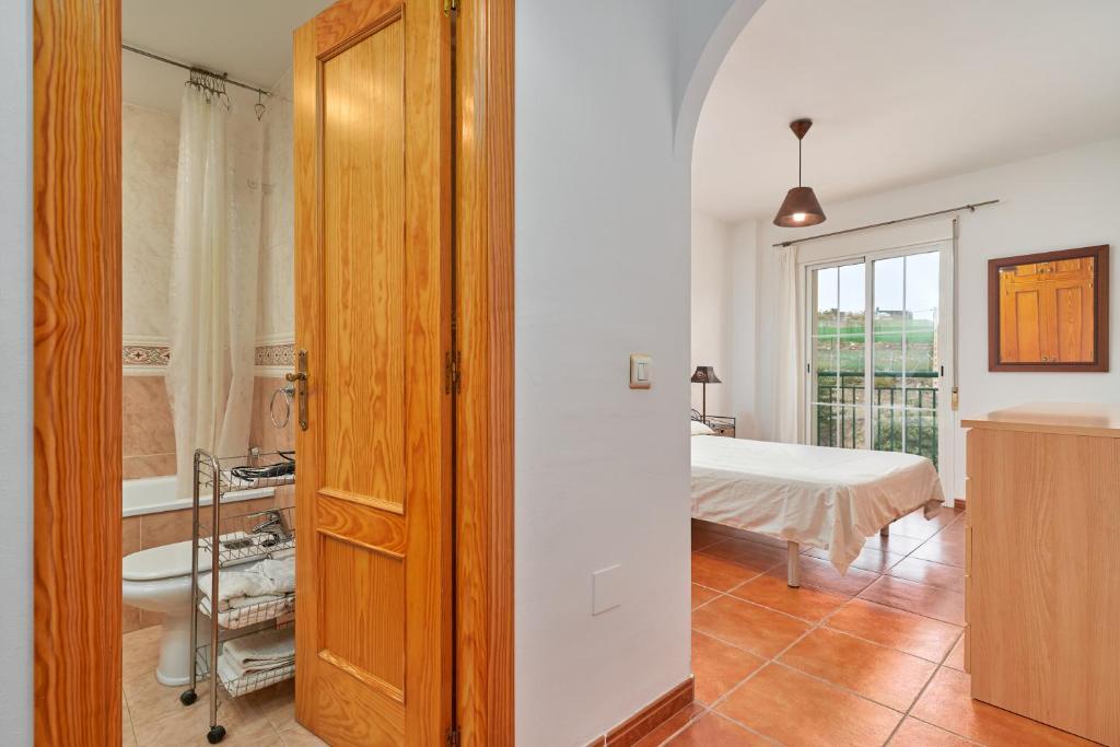 Posteľ alebo postele v izbe v ubytovaní Beachfront apartment Torrox Costa