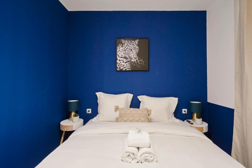 Postel nebo postele na pokoji v ubytování NG Prestige - Lille I Roubaix Jouffroy - Netflix - Wifi